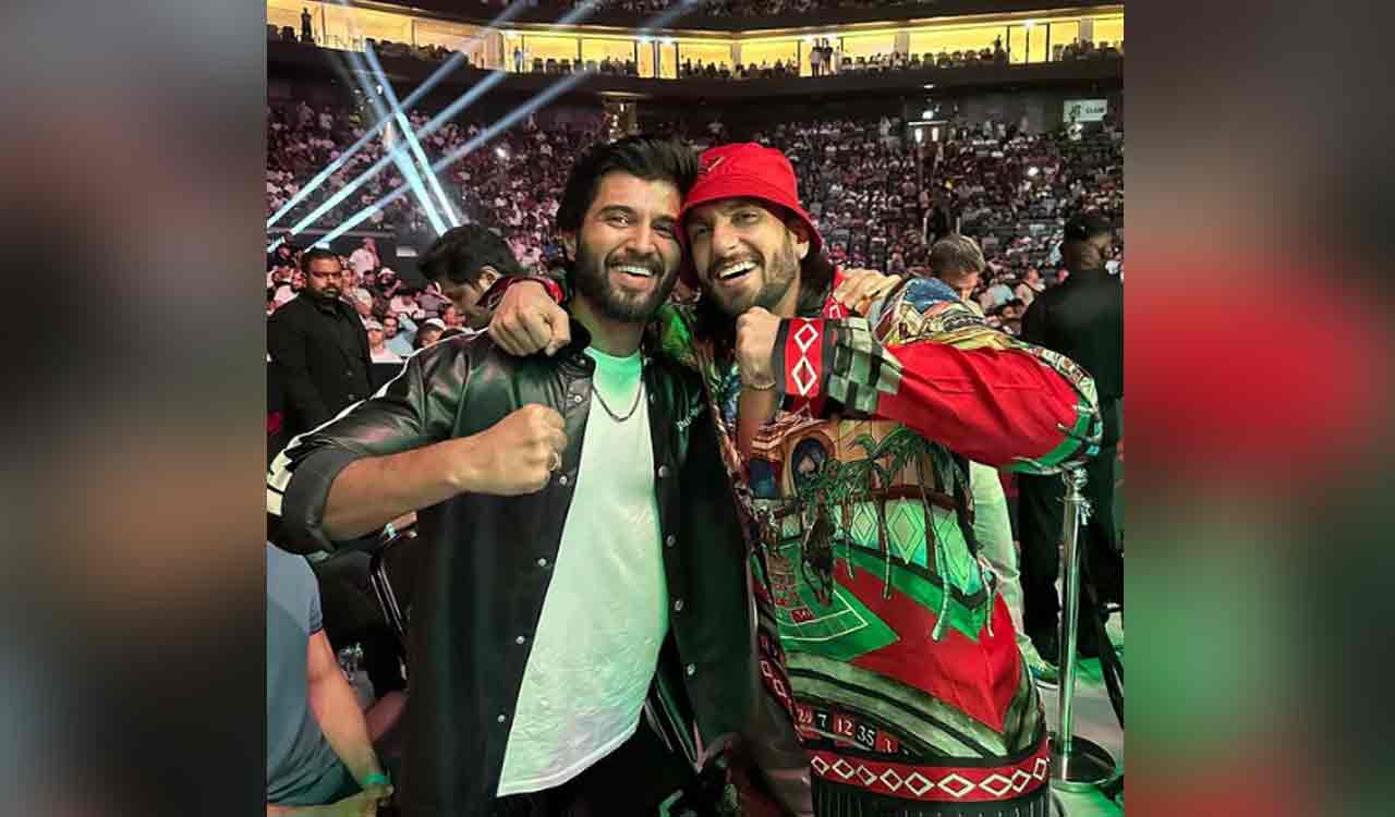 Vijay Deverakonda poses with Ranveer Singh in MMA style