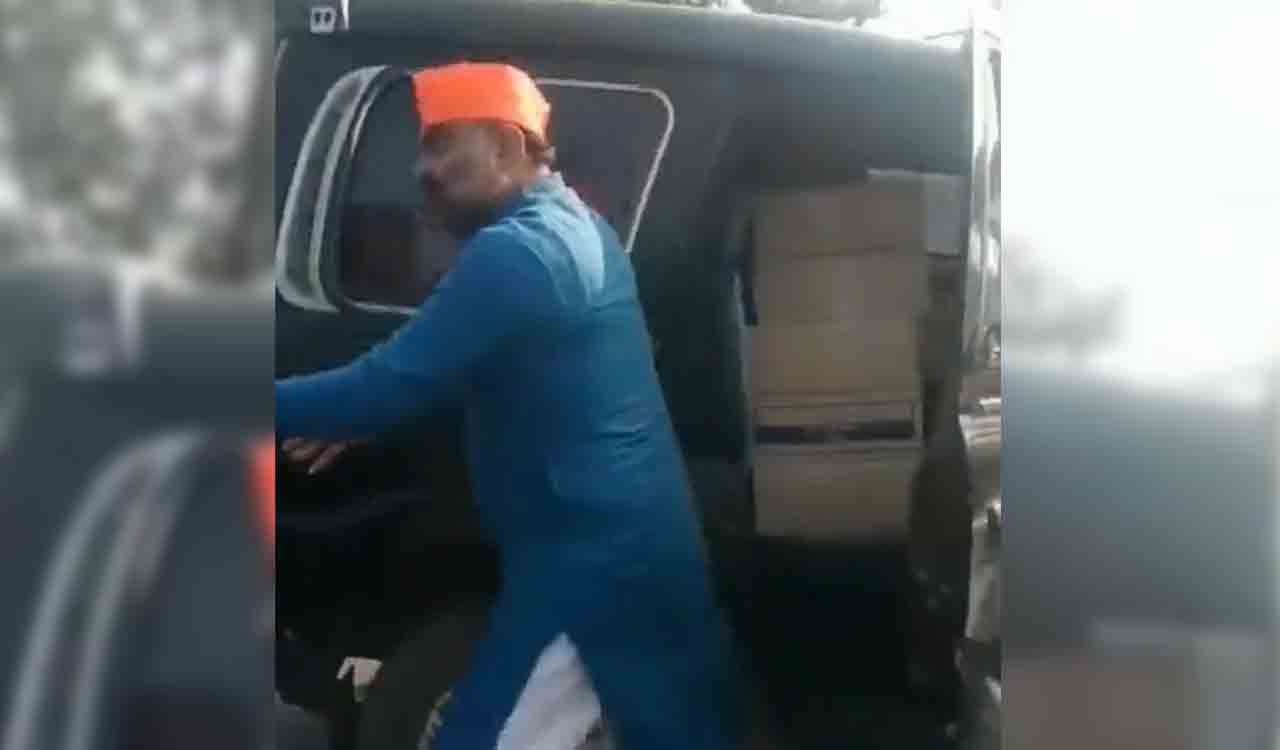 BJP leader distributes liquor during polling in Gujarat