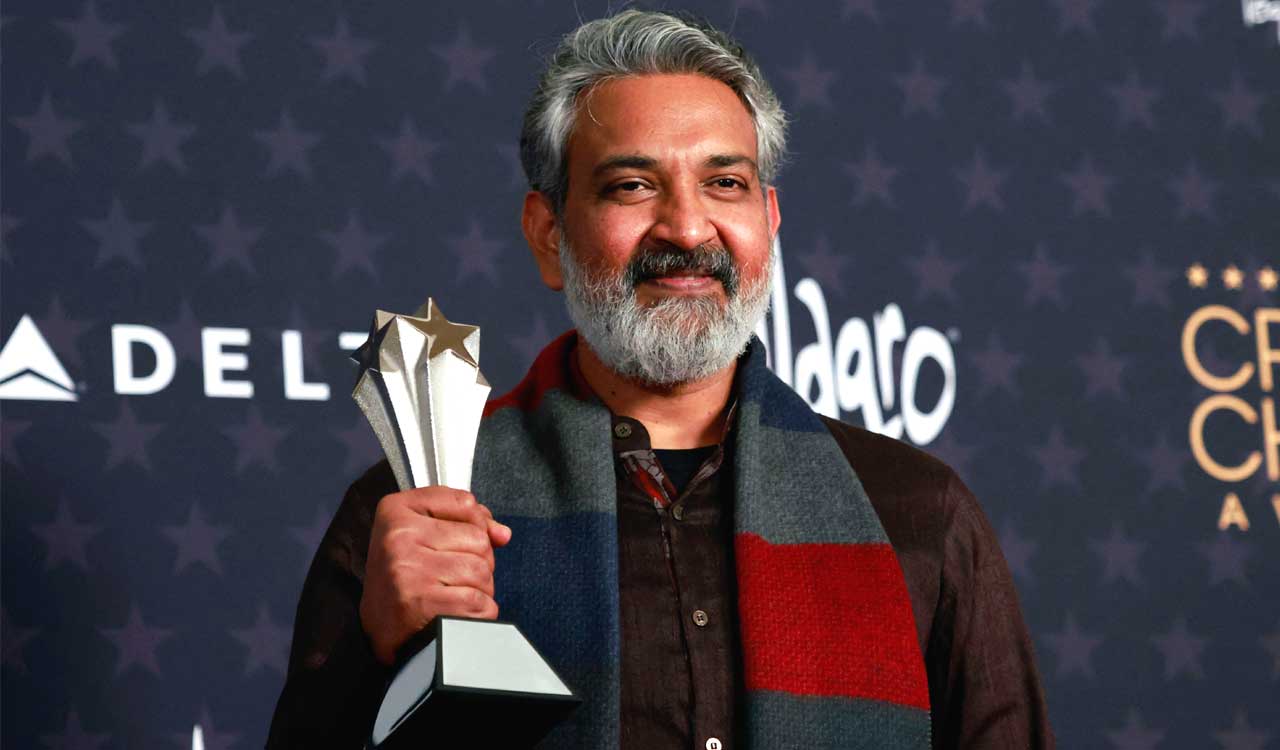CCA2023: S.S. Rajamouli poses with award