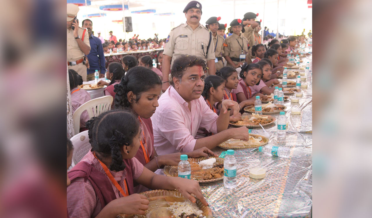 KTR interacts with MJP school students, dons role of teacher at Kamalapur