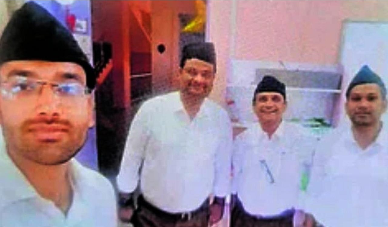 Row erupts after lecturers pose in RSS uniform in Karnataka