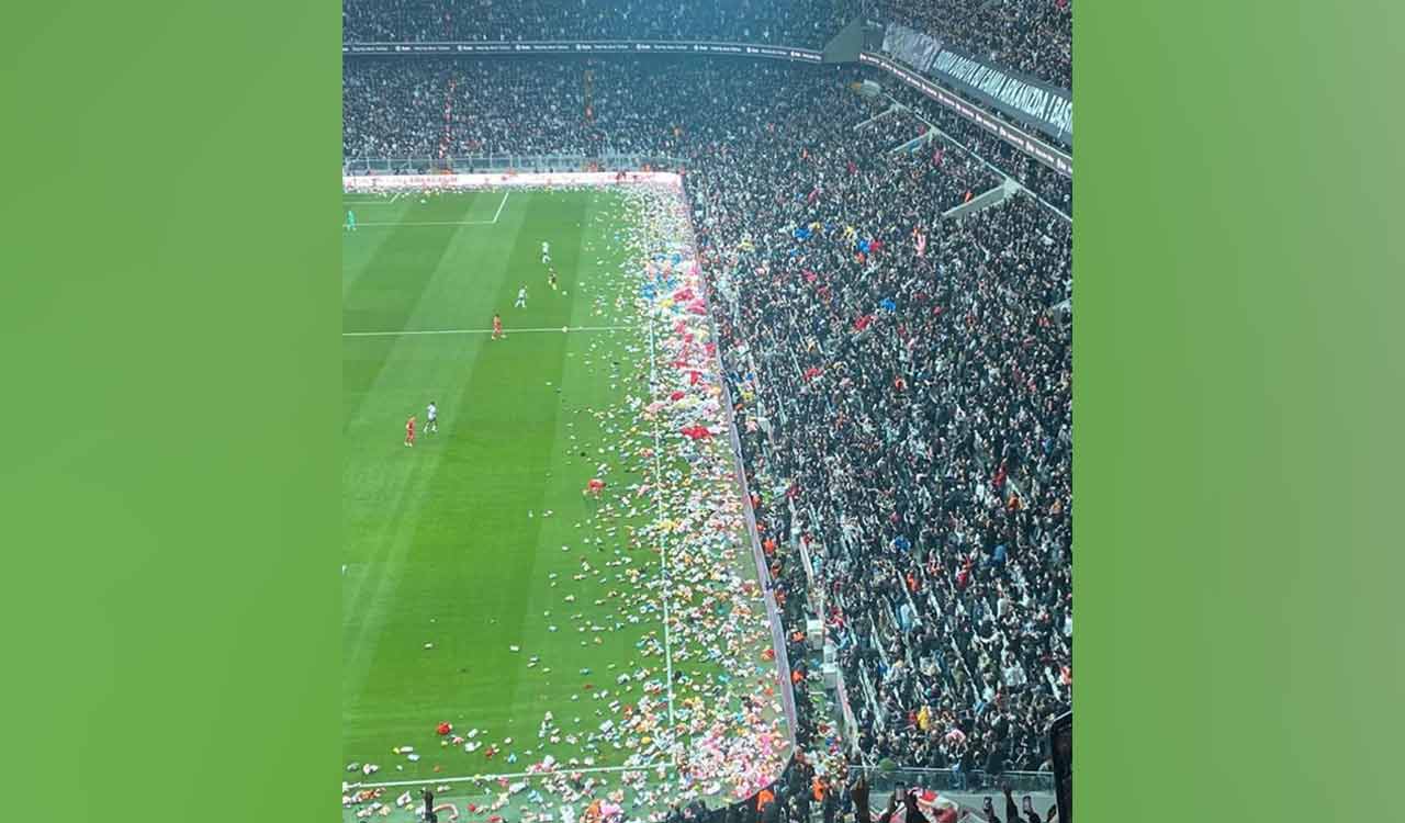 Fans shower football field with toys for quake-hit children in Turkey