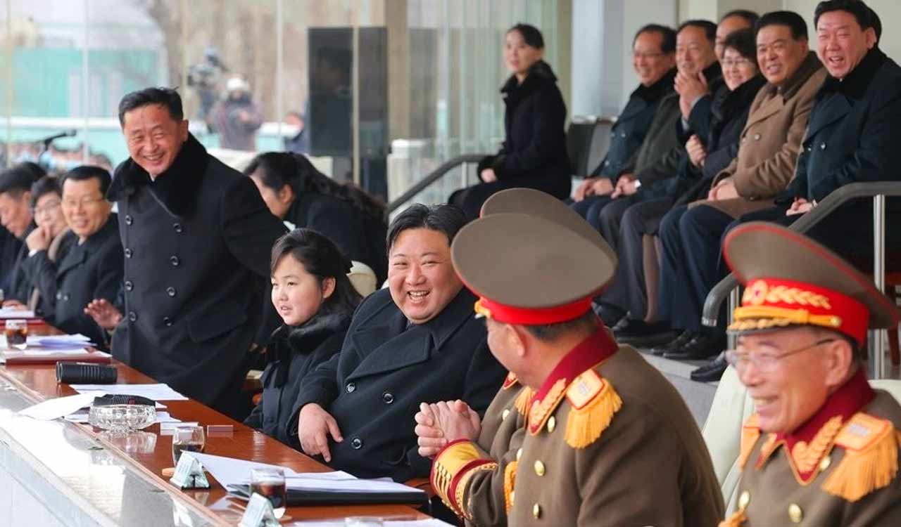 Kim Jong-un watches football match with daughter