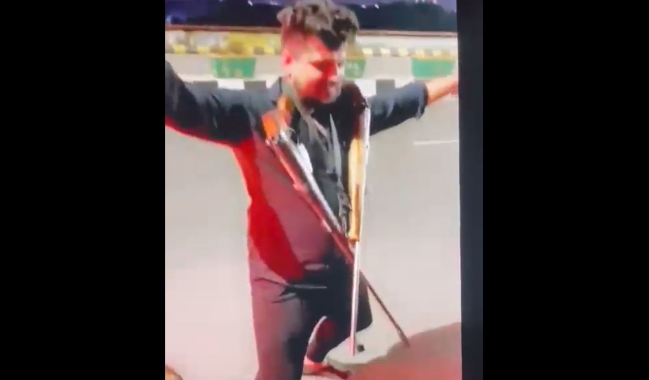 Viral video: Men dance with rifles while drinking on the road