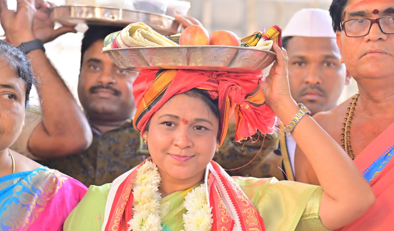 Jagtial Collector Yasmeen Basha presents silk cloths to Dharmapuri Lakshmi Narasimha Swamy