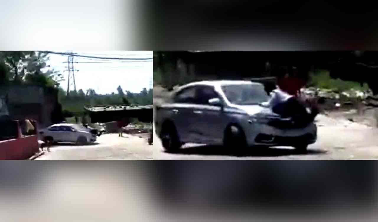 Driver drags constable for kilometre on bonnet