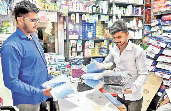 A person at a medical store buying masks