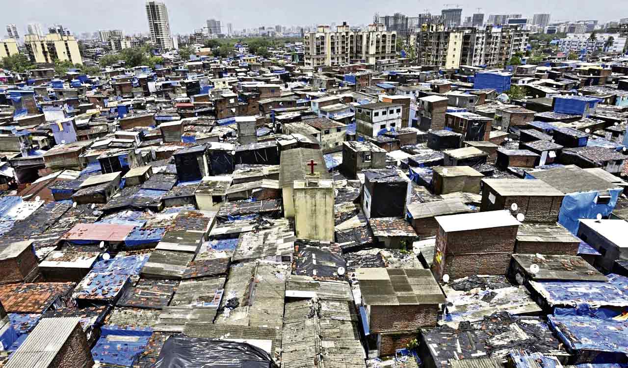BJP ‘tweaked’ rules to gift Dharavi to Adani