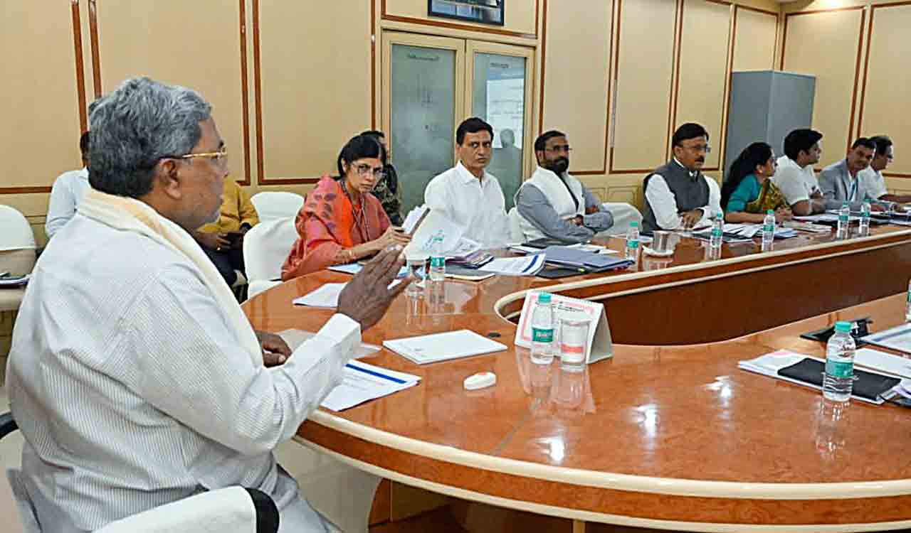 K’taka CM Siddaramaiah holds meet with officials on implementation poll guarantees 
