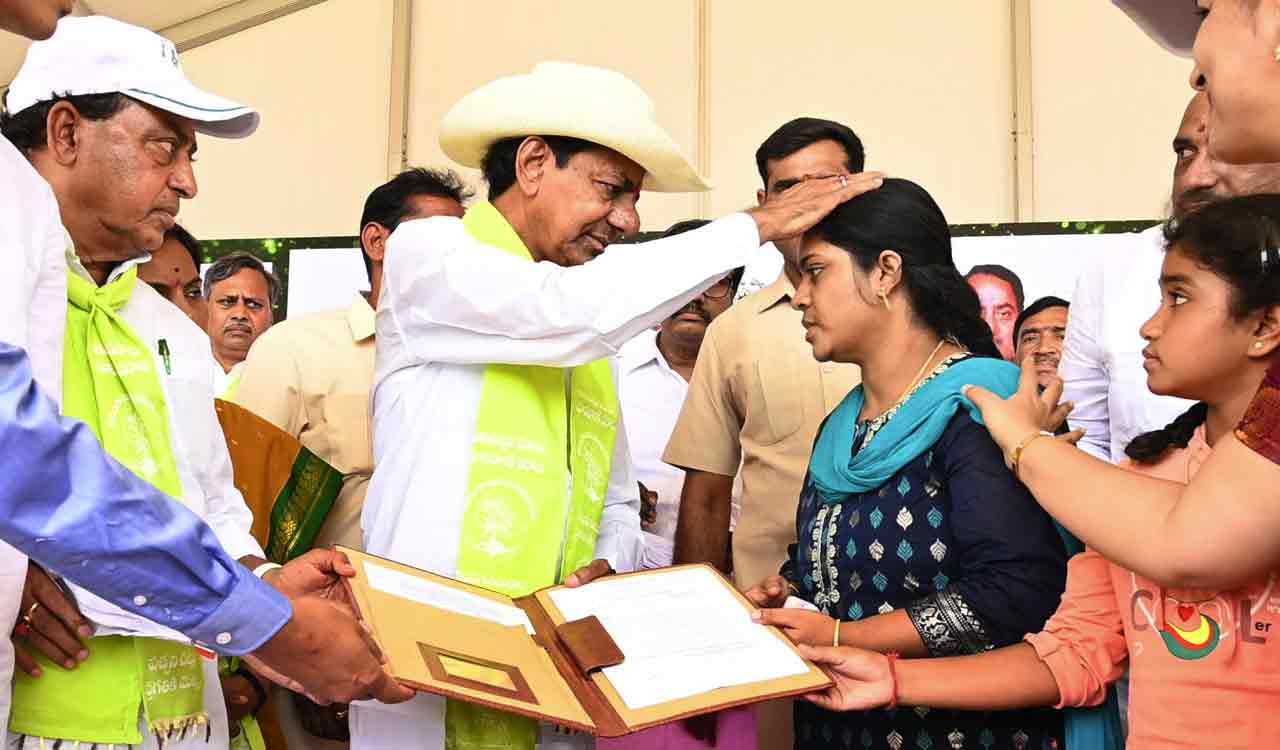 CM KCR hands over appointment letter to wife of slain FRO