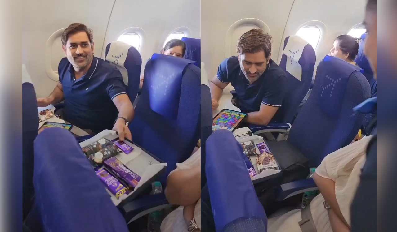 This is how Dhoni reacted after air hostess served him chocolates with a note