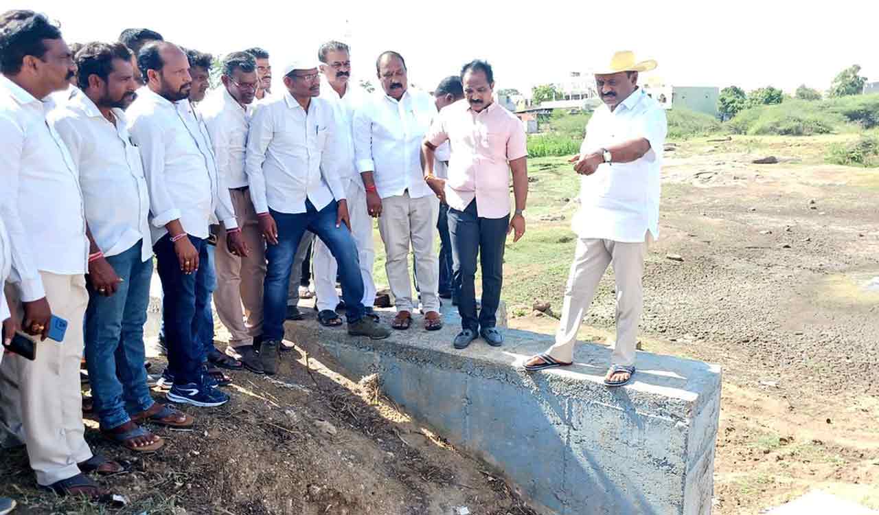 MLA Challa Dharma Reddy inspects progress of Parkal mini tank bund