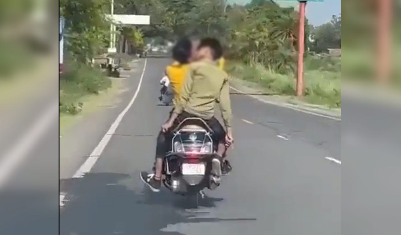 Watch: Two boys indulge in ‘PDA’ on scooty 