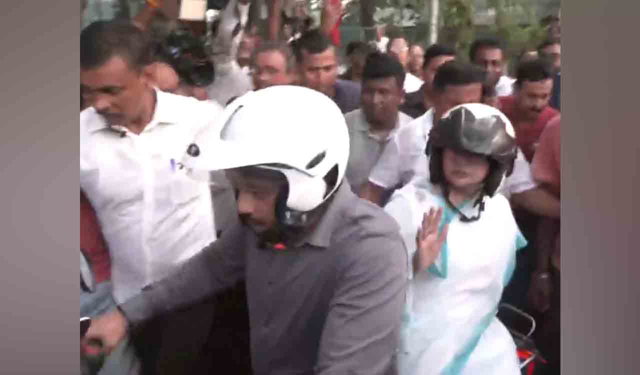 Kolkata: Mamata Banerjee rides pillion on bike during march in support of wrestlers