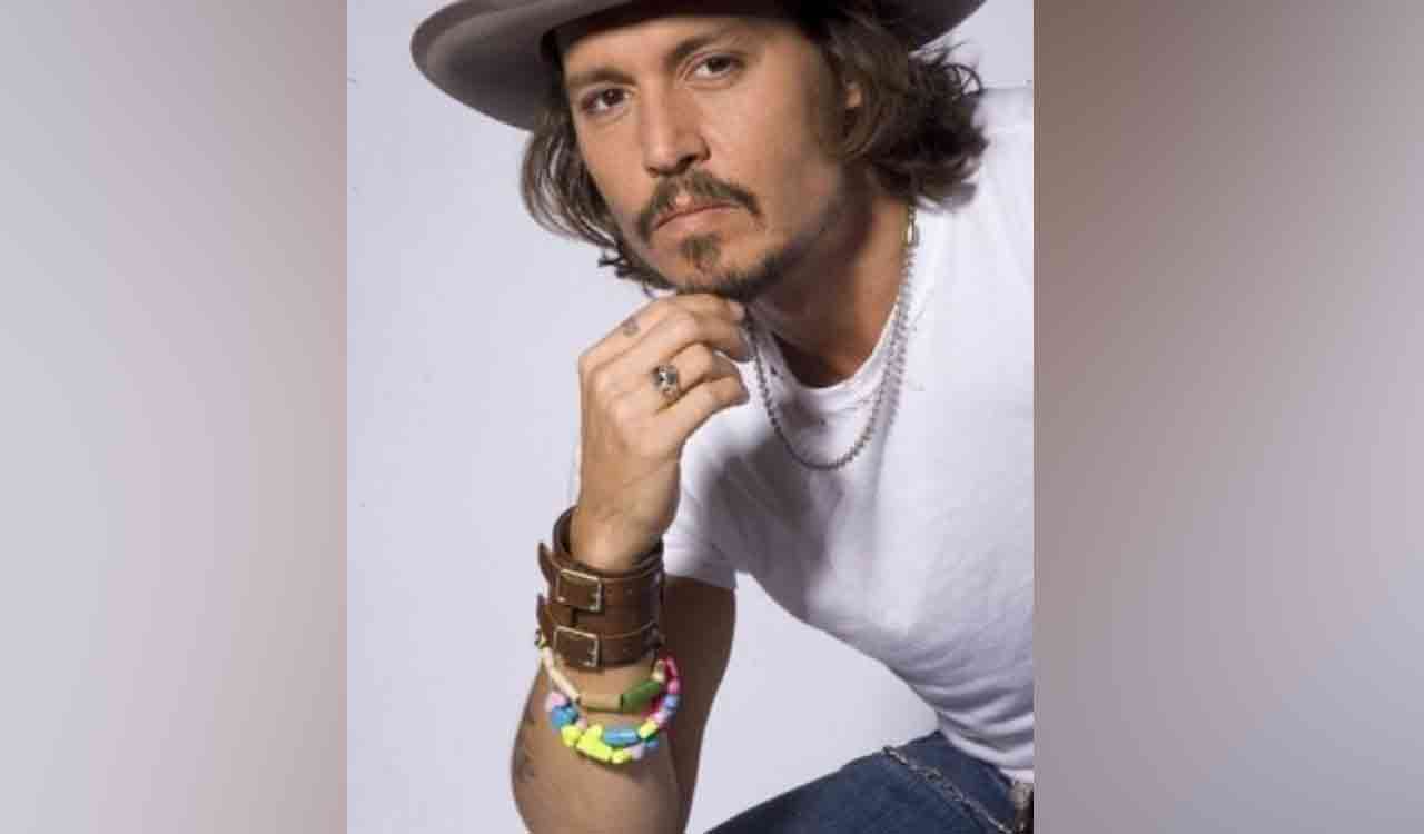 Johnny Depp auctions off his autographed self-portrait in support of charity