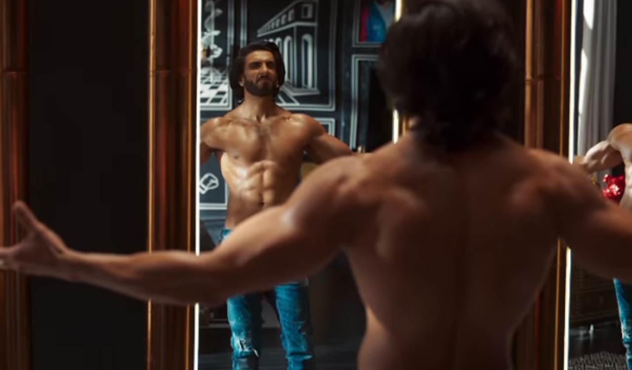 Ranveer displays his well-toned physique, offering a sneak peek into Rocky’s extravagant lifestyle