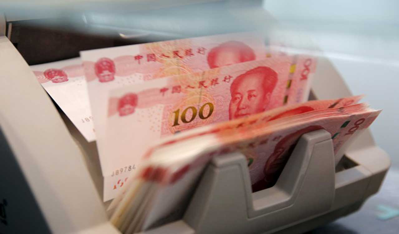 China’s stocks hit nine-month lows as Chinese yuan weakens