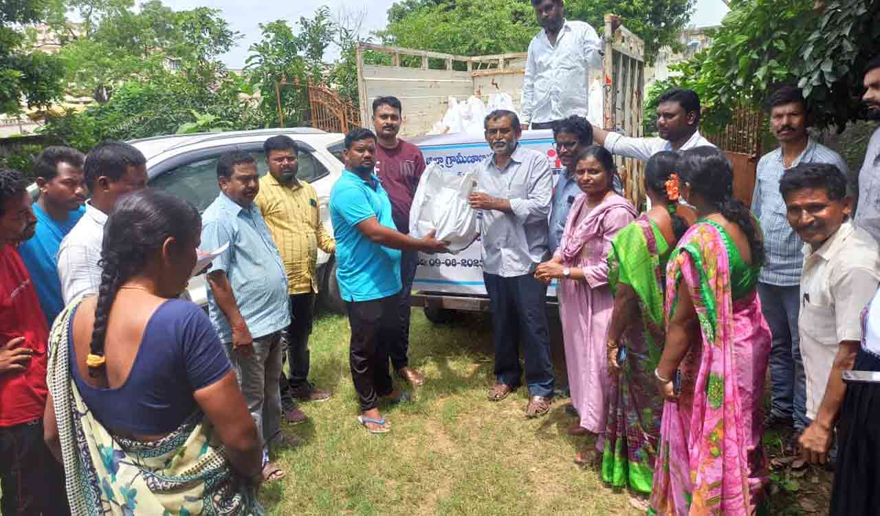 DRDO-SERP employees donate utensils to flood-hit families in Mulugu district