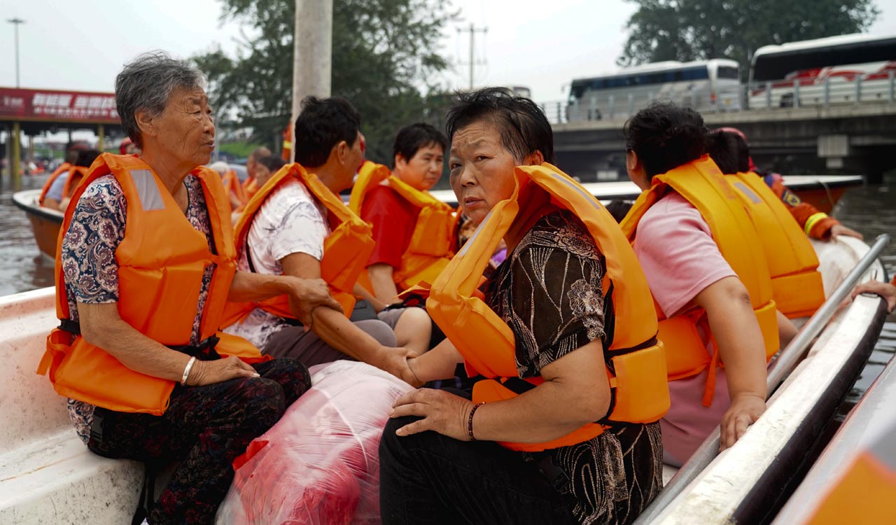 Highway bridge in China collapses due to flash floods