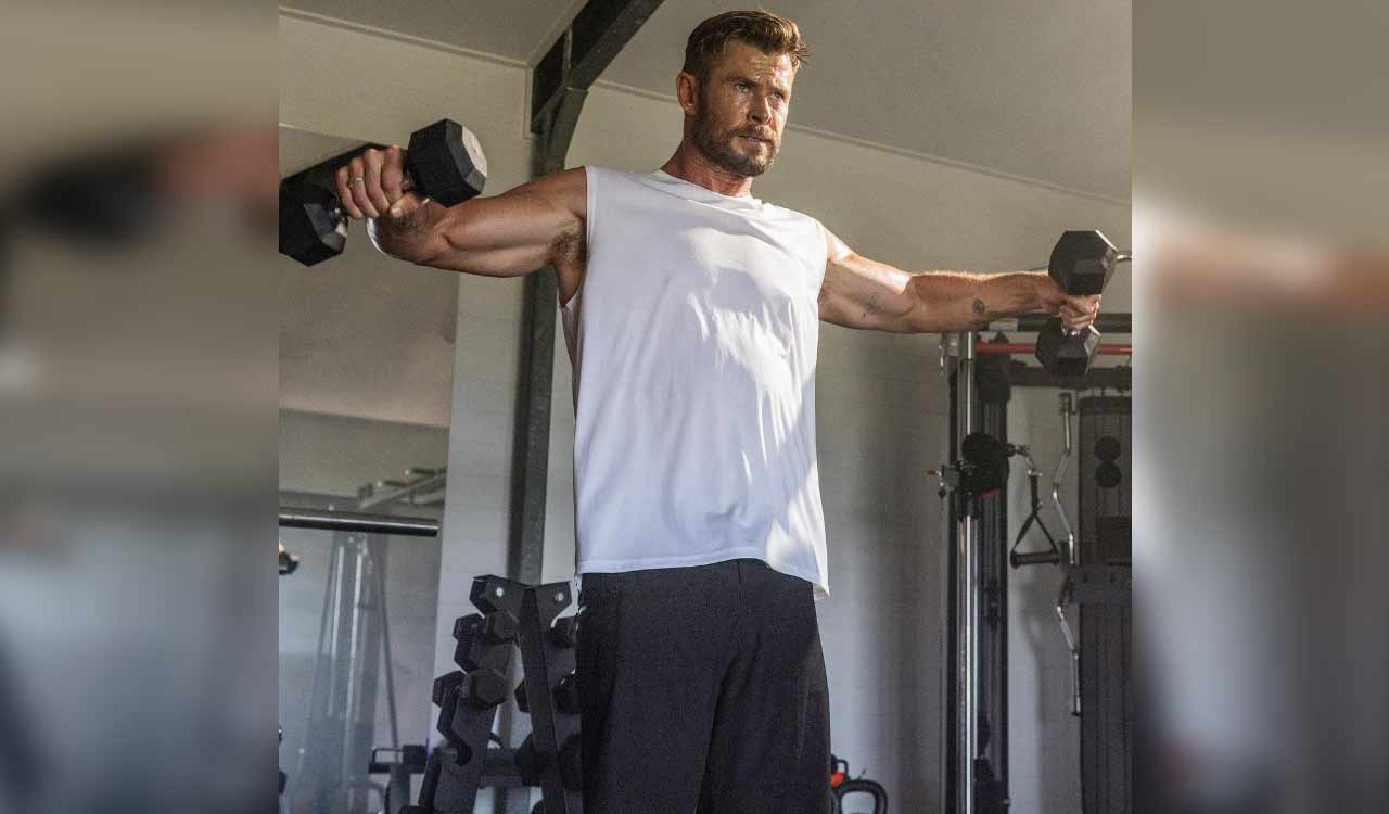 Chris Hemsworth flaunts his ripped muscles during shirtless workout
