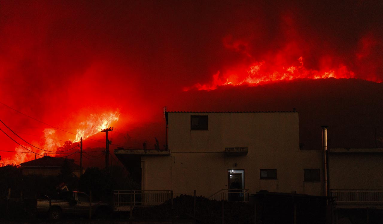 Greece wildfires: Authorities say bodies of 18 people found