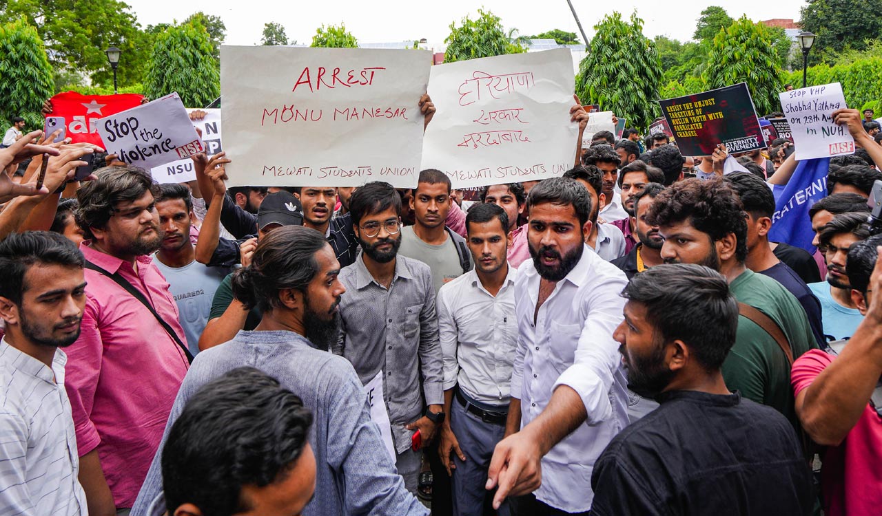 Students’ outfits hold protest at Jamia Millia over Nuh violence, demand arrest of Monu Manesar