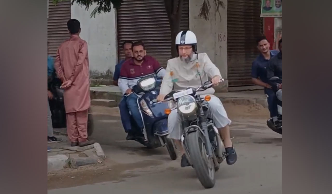 Asaduddin Owaisi vrooms on bike in Hyderabad
