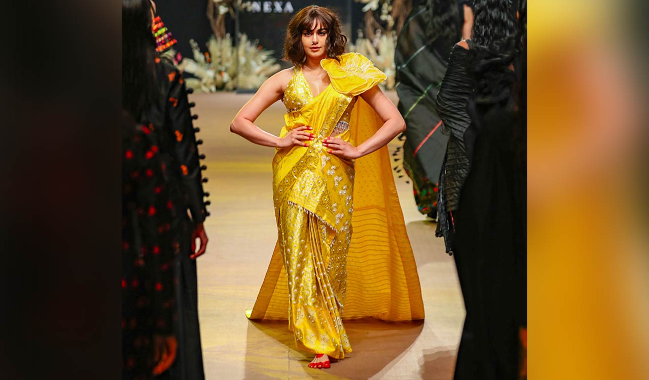 Adah Sharma brings festive vibes to LFW 2023 as she walks the ramp in yellow saree