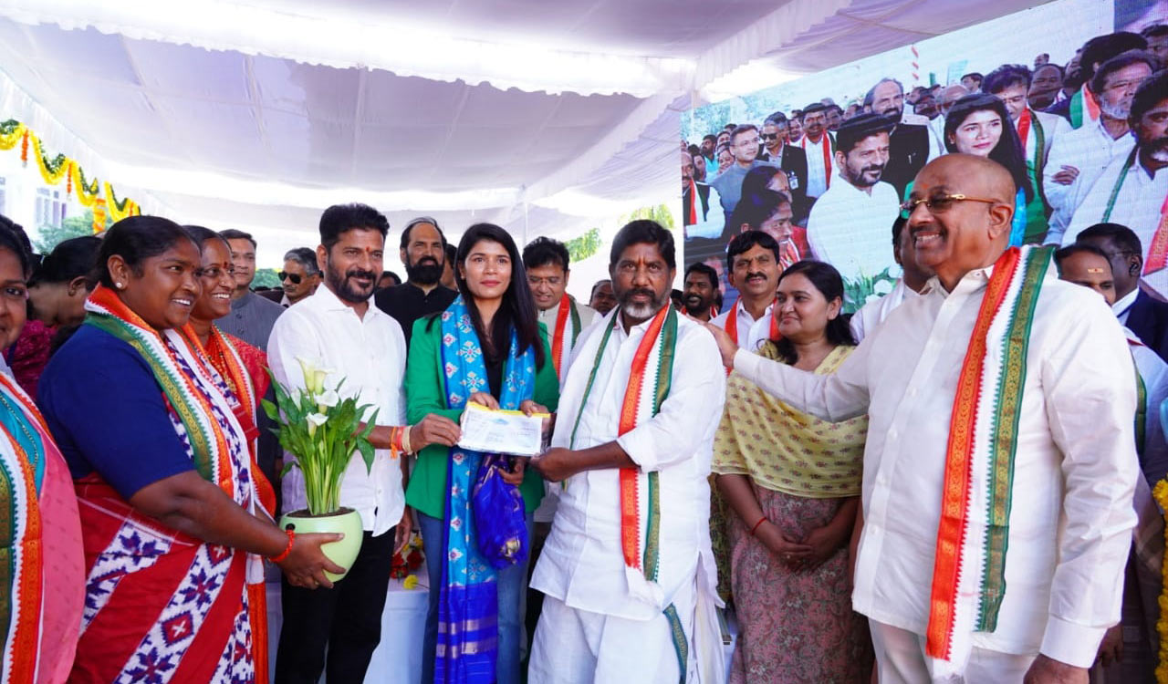 CM Revanth Reddy presents cheque for Rs 2 cr to boxer Nikhat Zareen