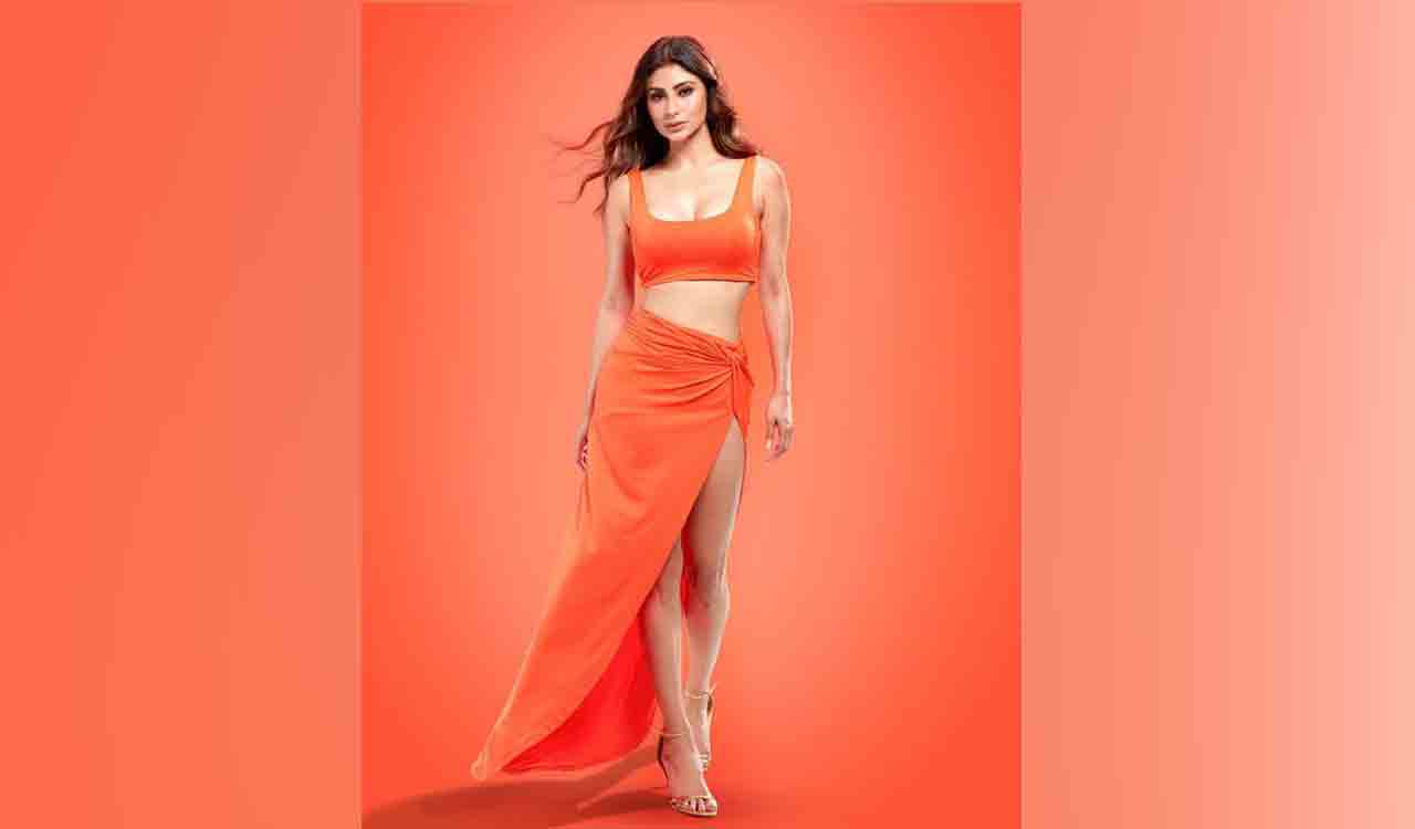 Mouni Roy dances in a shimmery golden outfit