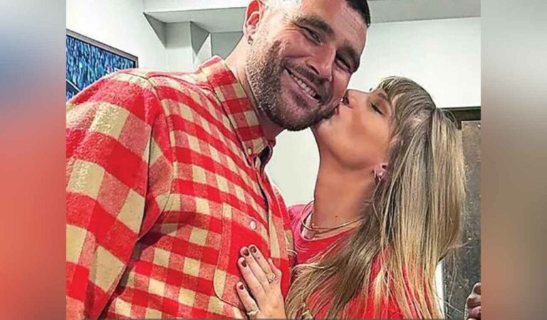 taylor swift travis kelce pack on pda as they share kisses on field