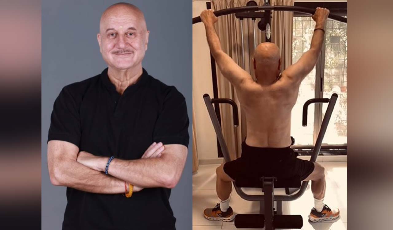 Anupam Kher tackles heavy qeights for back workout
