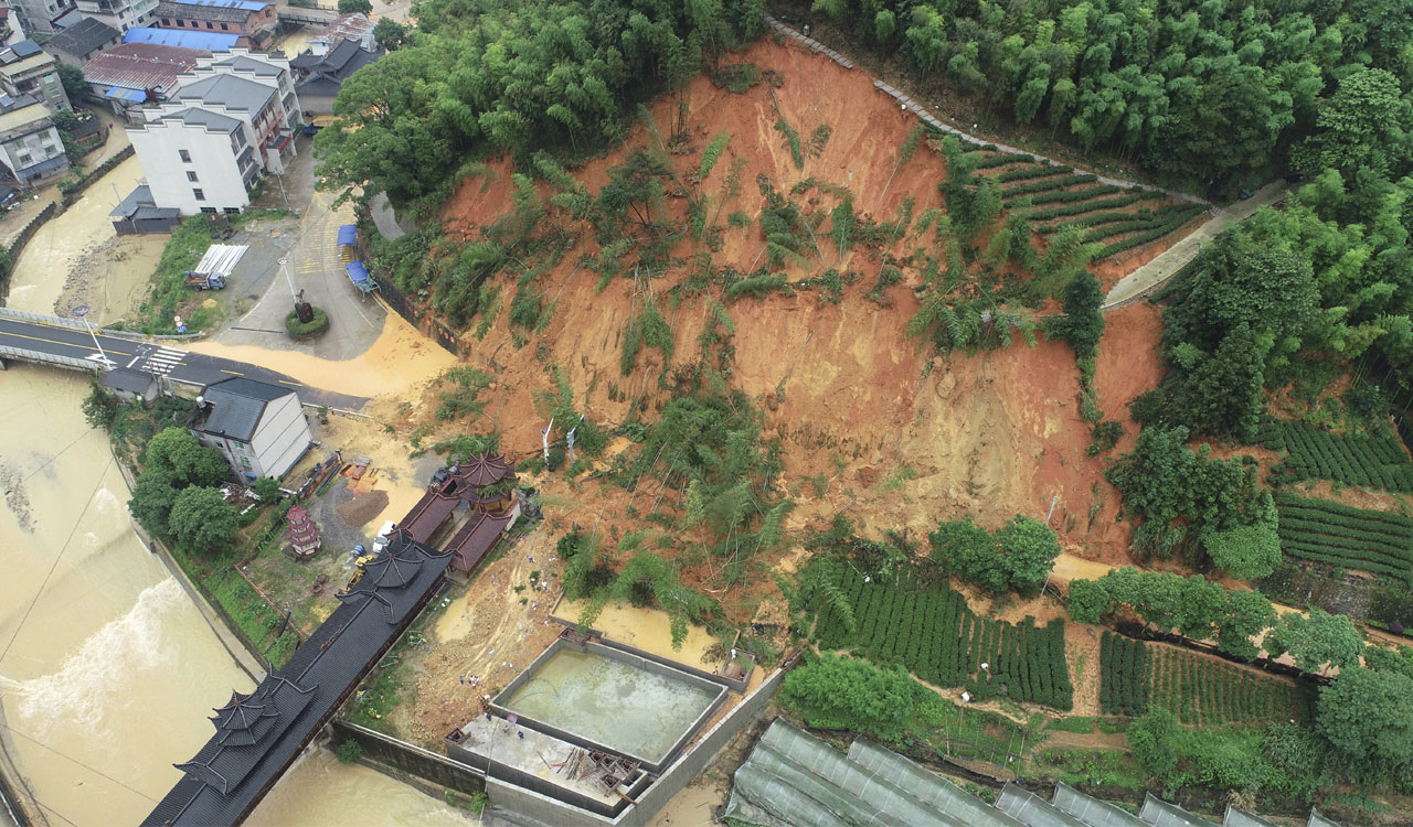 Nine dead as heavy rains trigger floods, landslides in Southern China
