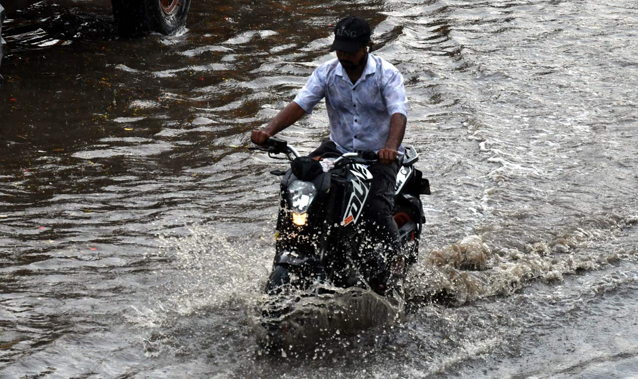 DRF teams jump into action to clear waterlogged roads of Hyderabad after heavy downpour