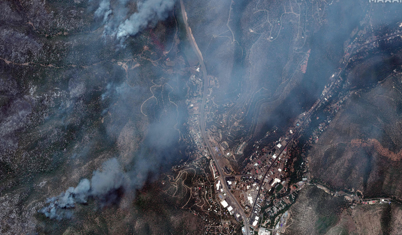 1,000 firefighters slow big New Mexico blaze, thanks to rains
