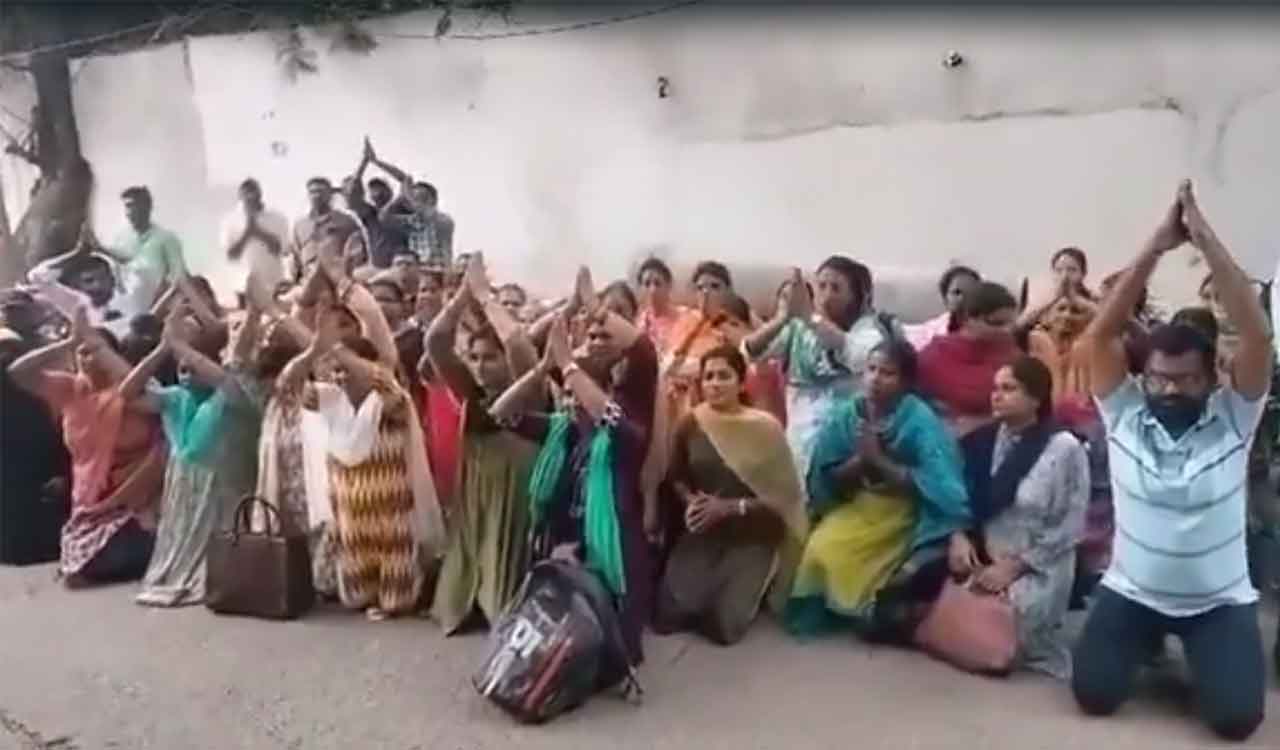 Watch: Teaching job aspirants hold sit-in by kneeling down at CM Revanth’s residence