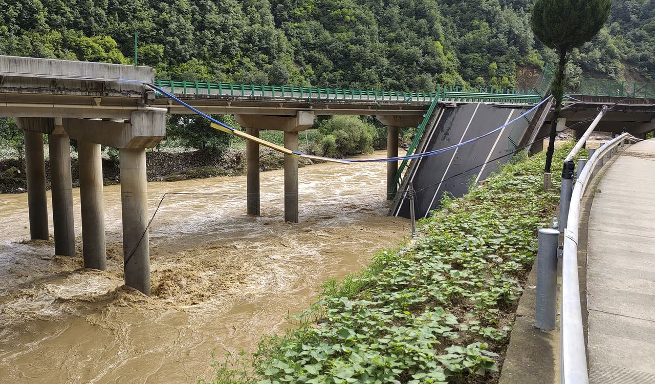 China: 11 killed, over 30 missing as bridge collapses due to flash floods