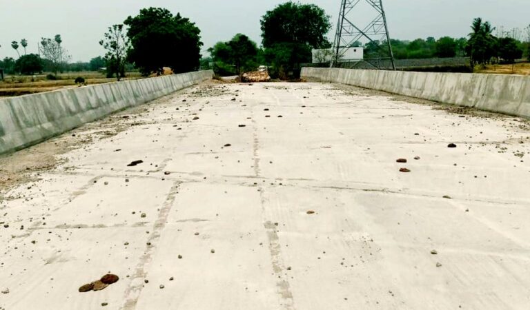 The earthen road connecting to the bridge, which is already in a bad condition, was further damaged due to heavy water flow in the rivulet following continuous drizzling.