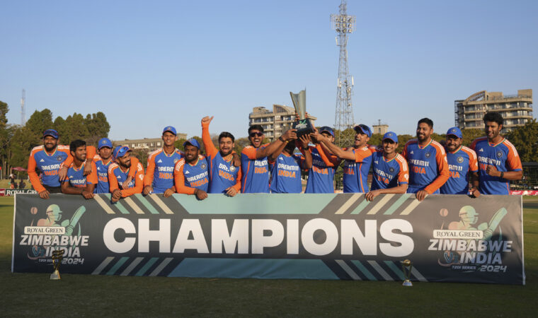 Indian players celebrate with the trophy after winning the T20 cricket series against Zimbabwe at the Harare Sports club, in Harare, Sunday, July 14, 2024.