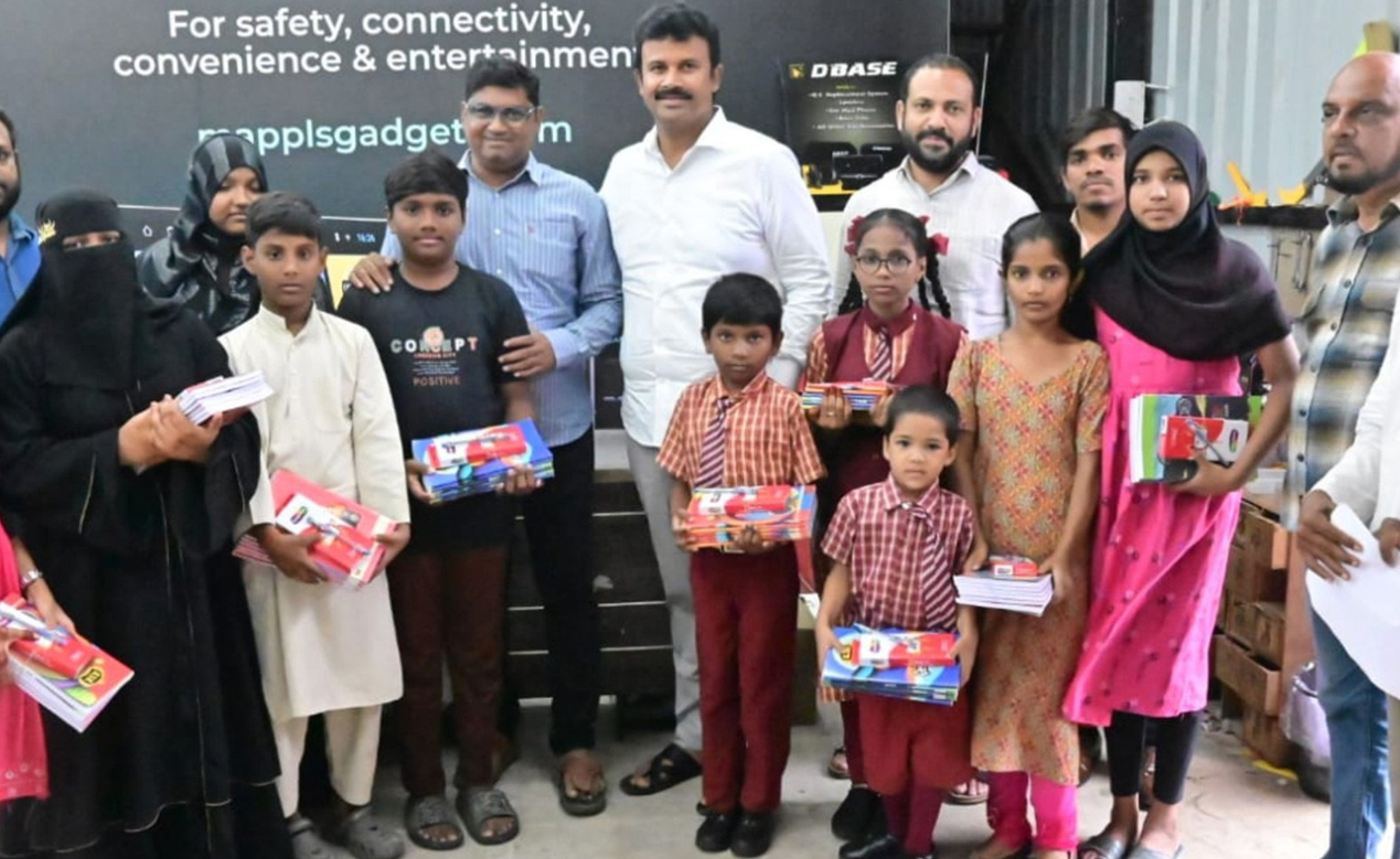 Khammam: Books distributed to underprivileged students