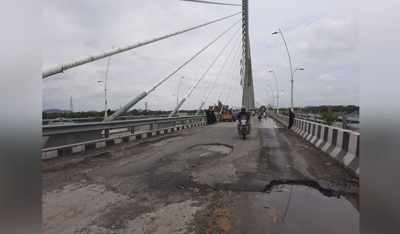 Rains: Karimnagar cable bridge road damaged; Road in Siddipet turns slushy
