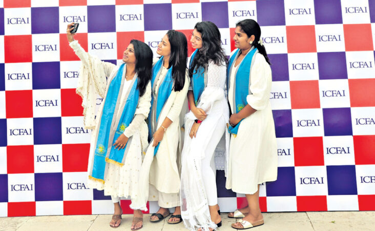Jubilant students take a seflie at ICFAI Universitys 14th convocation ceremony