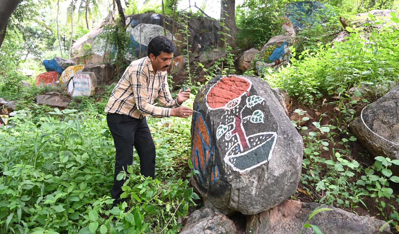 OU employee paints campus rocks, boulders to spread message