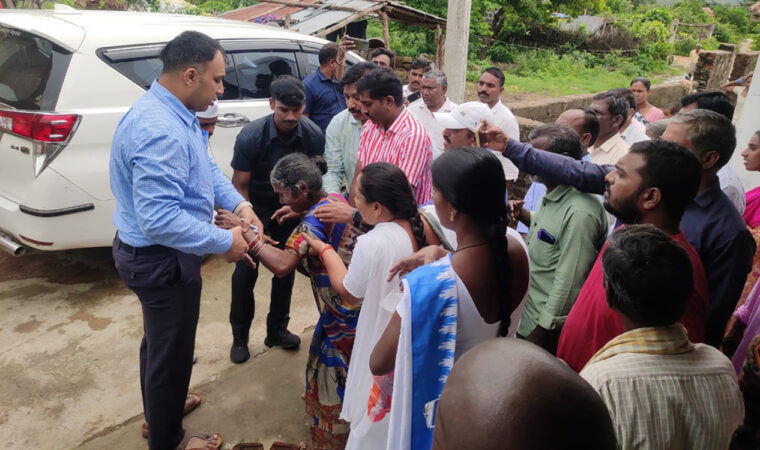 Rajanna-Sircilla Collector Sandeep Kumar Jha interacting with the parents of Nayana Sree in Garjanapalli of Veenrnapalli mandal on Friday.