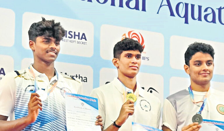 Telangana's Preetham Mylari Suhas (left) at the podium in Bhubaneswar on Wednesday.