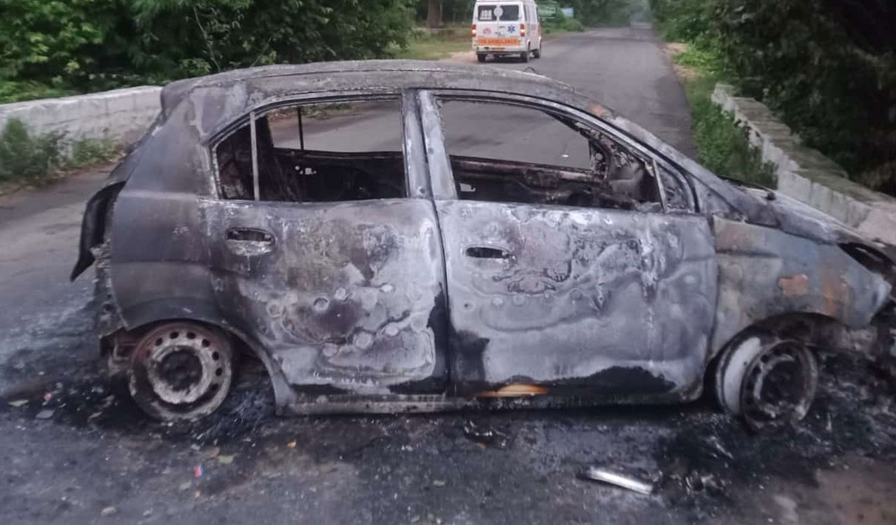 Asifabad: Car goes up in flames after ramming culvert, one injured