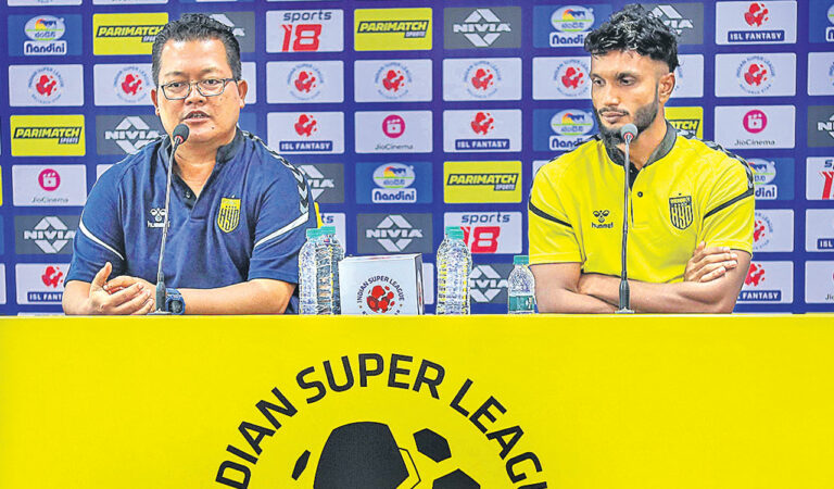 HFC head coach Thangboi Singto (left) and captain Alex Saji interacting with the media in Hyderabad on Monday.