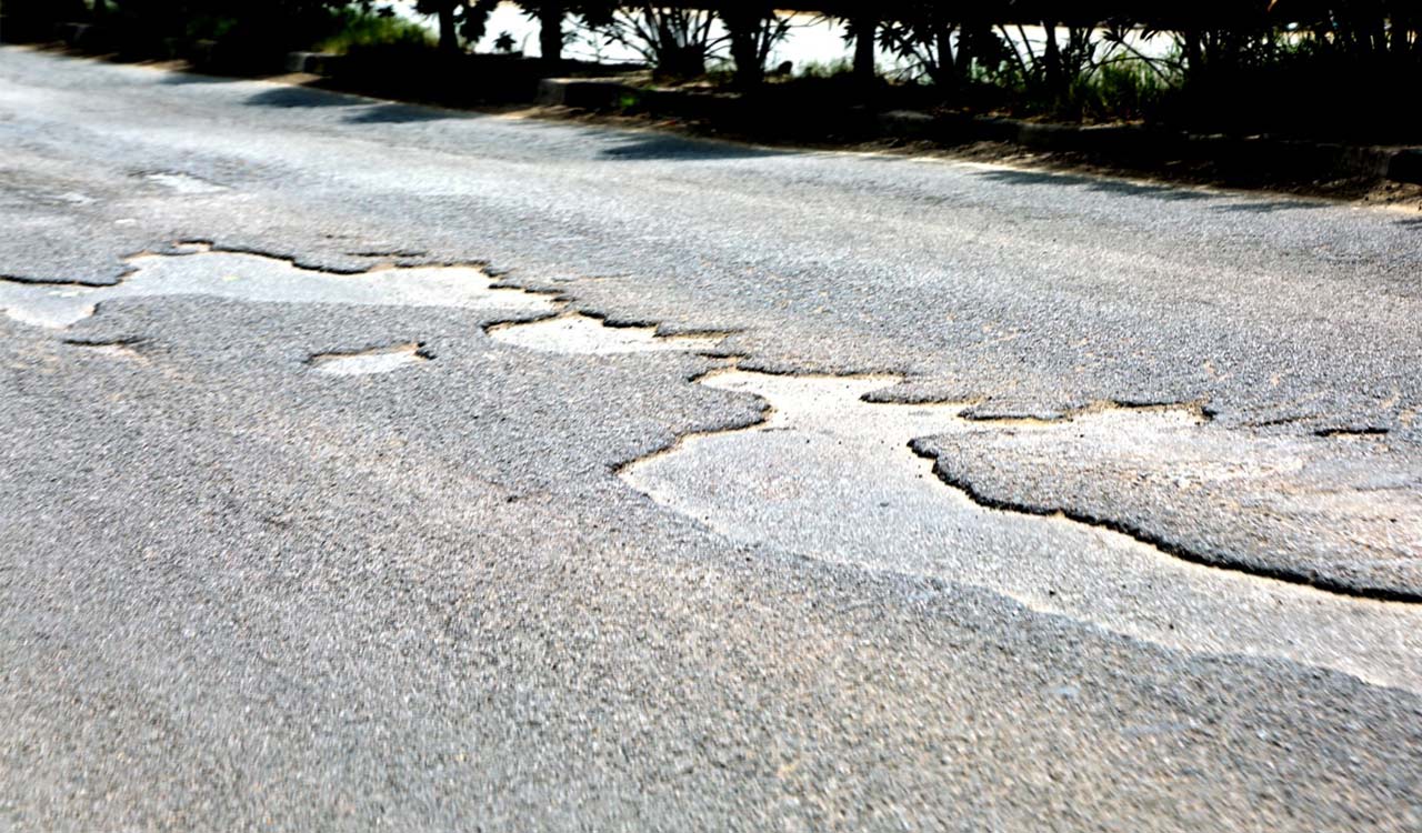 Sangareddy: Potholes make life difficult for road users on NH-65