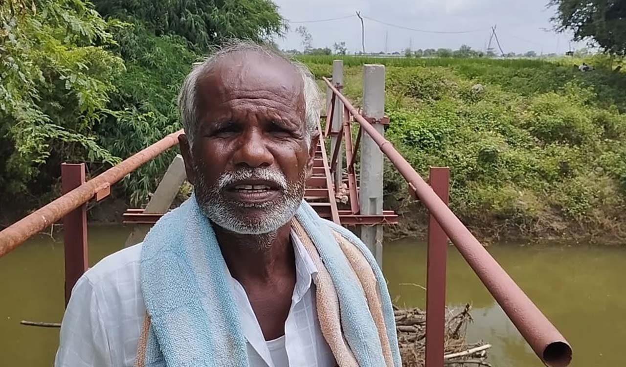 Medak: Farmer builds bridge across stream to reach his field