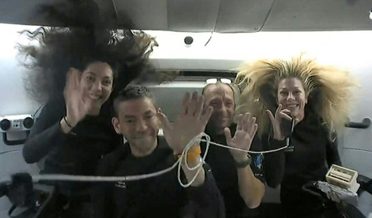 Tech billionaire returns to Earth after first private spacewalk